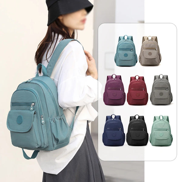 Ladies' lightweight, large capacity stylish black commuter travel backpack with adjustable shoulder straps, school and leisure b
